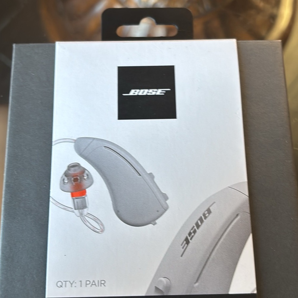 Bose Wireless Hearing Aids in Gray and Red